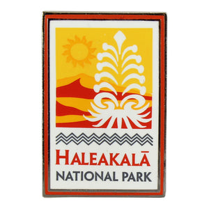 Rectangular yellow, white and orange Haleakalā National Park log pin is enameled and measure 1.75” by .75” Logo shows silversword plant, the rising sun, a volcanic landscape.