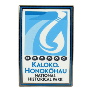 Rectangular blue and white pin shows fishhook and fishpond logo of Kaloko-Honokōhau National Historical Park on Hawaiʻi Island.